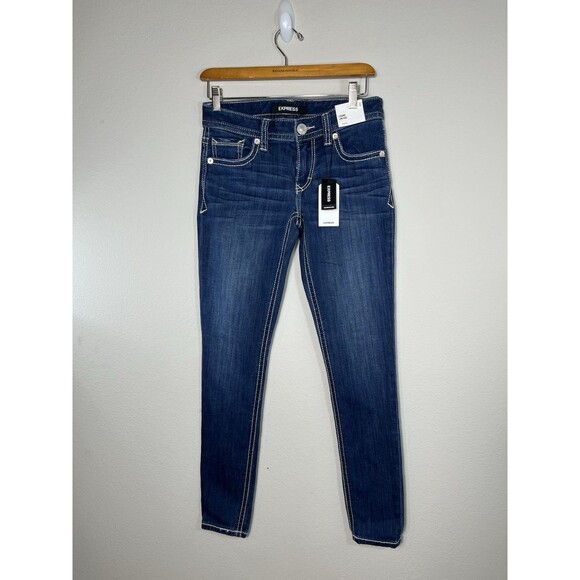 Express Jeans Low Rise Legging Size 4 Womens Medium Wash Blue Denim - Picture 1 of 12